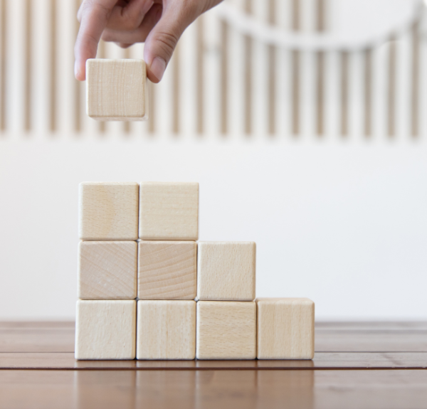 Stock photo of building blocks portraying growth.