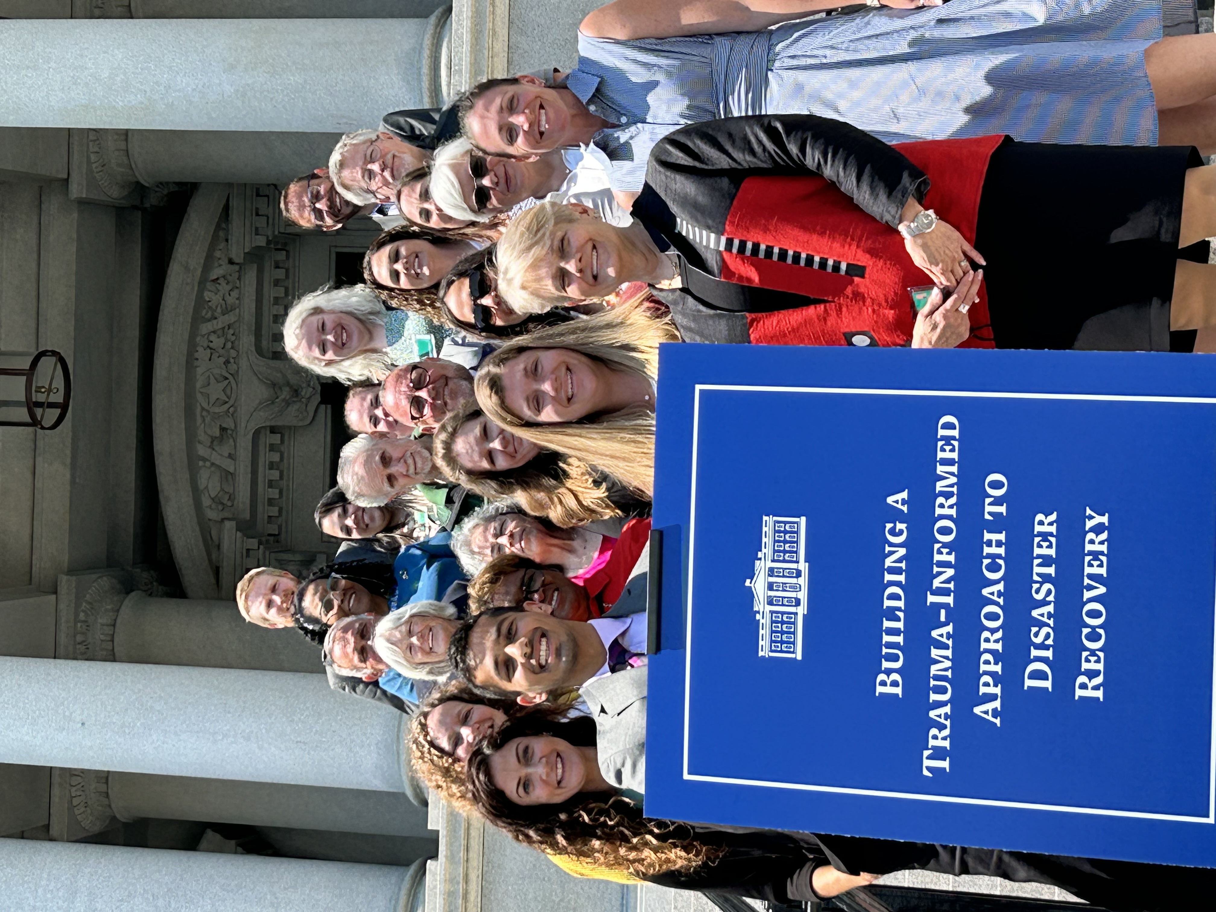 Image of disaster response leaders standing in front of White House'