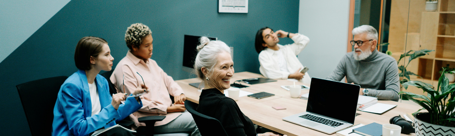 Group of people sitting in an office